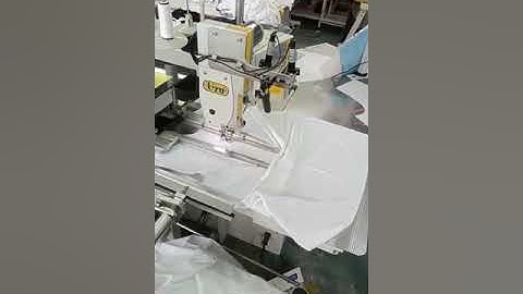 Knits - Auto Polo placket Operations using laser light. Good result. Zero placement error.