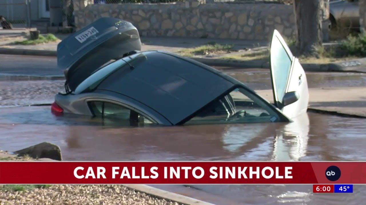 car falls into sinkhole