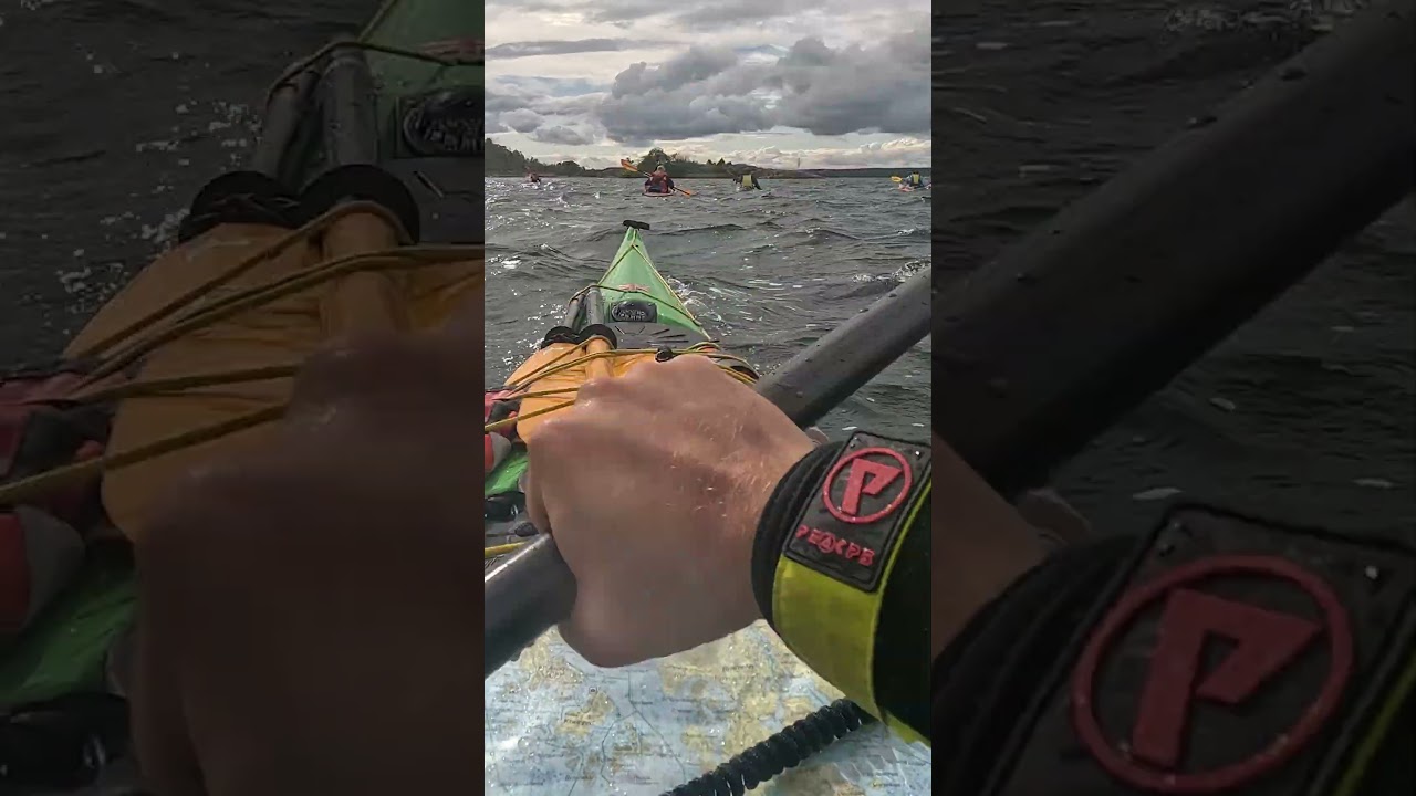 Sea kayaking in a group as one of the kayak leaders