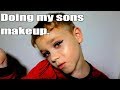 Doing my sons makeup.