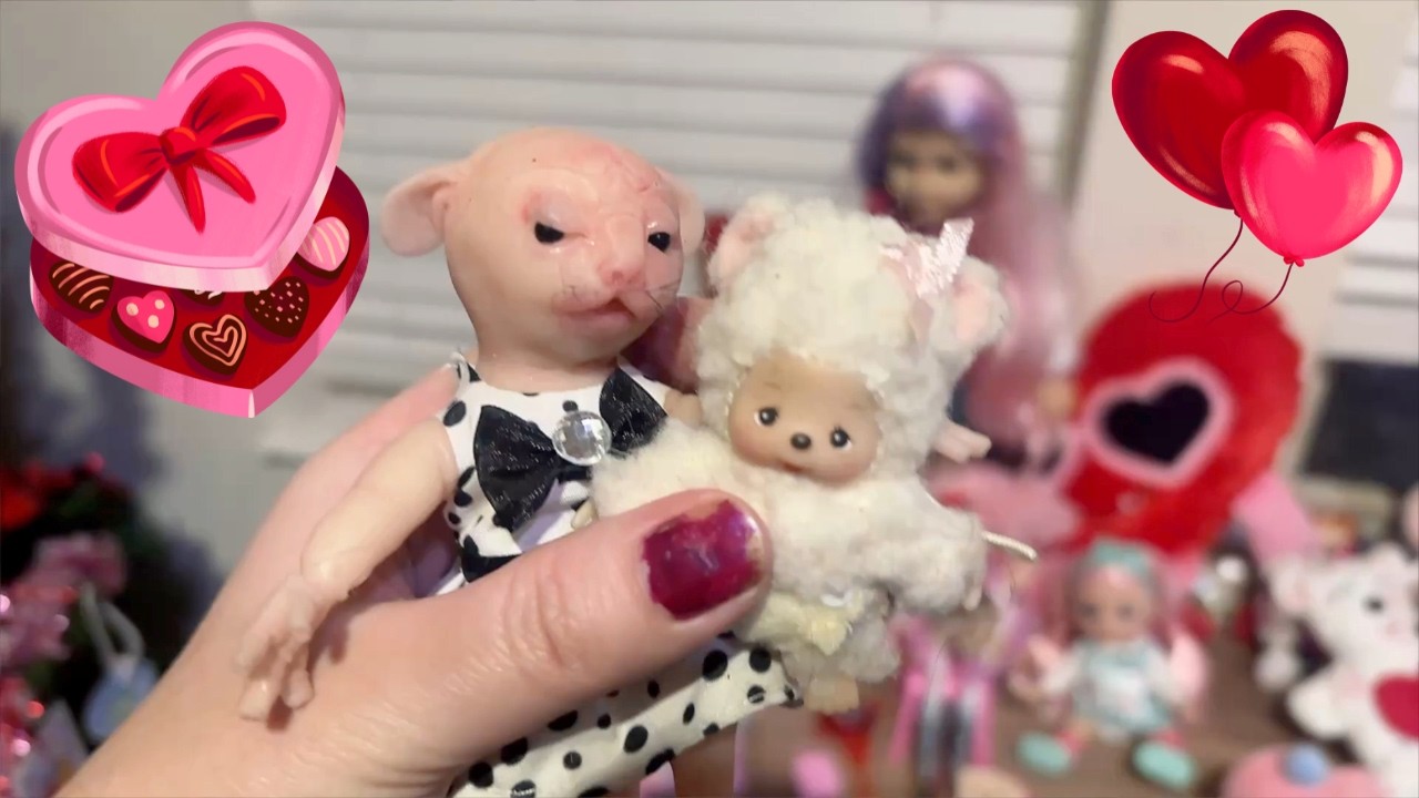 Our human rat Daisy sees our Valentine's tree and table