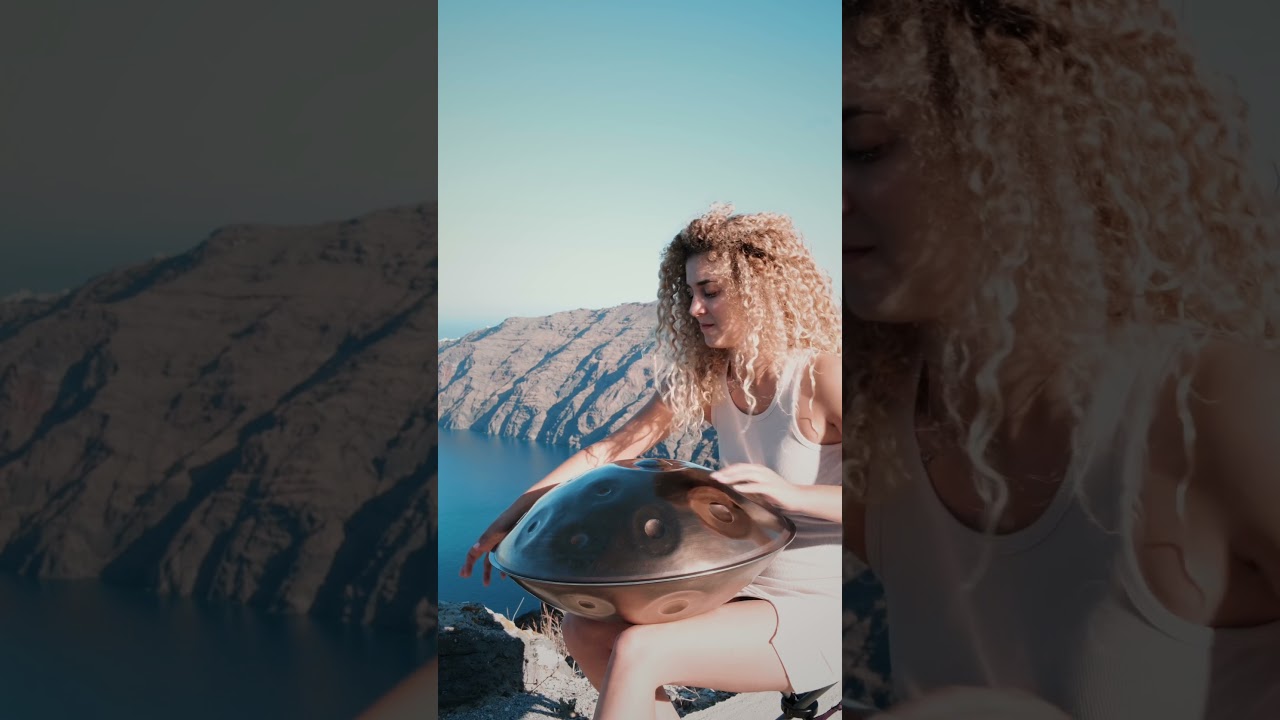 Creating magic with this beautiful Santorini view 😍🩵 #handpan #shorts #meditationmusic