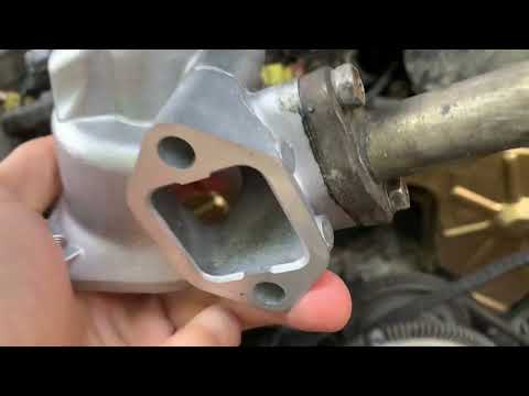 How to replace thermostat housing on Nissan pickup v6 D21 - YouTube