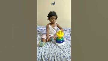 Two years old baby telling colours with stacking rings #stackingrings #coloursname #toys #shorts