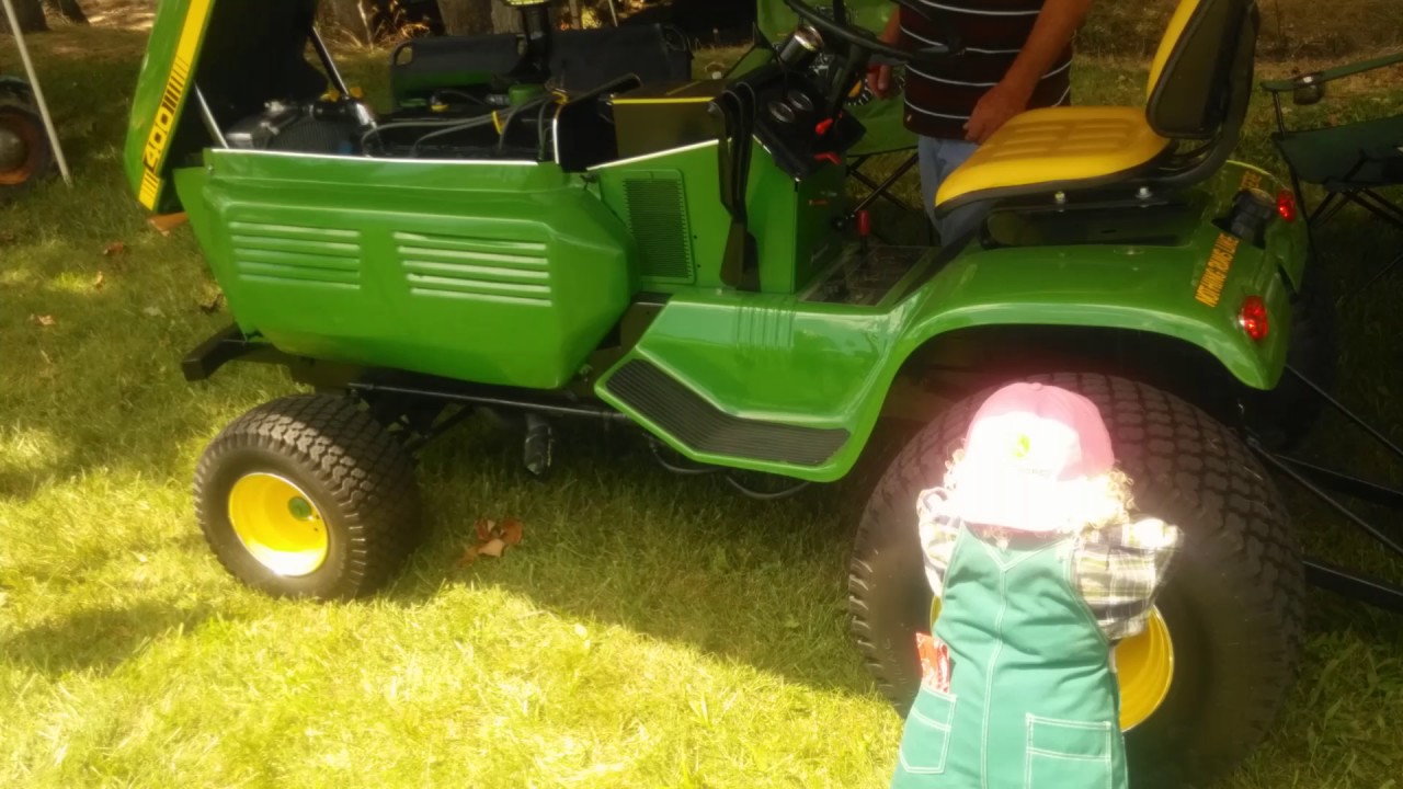 Modified John Deere lawnmower with 4cylr gmail engine swap - YouTube