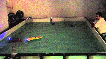 Autonomous Trajectory Tracking of of an Unmanned Surface Vessel in Simulated Rough Seas