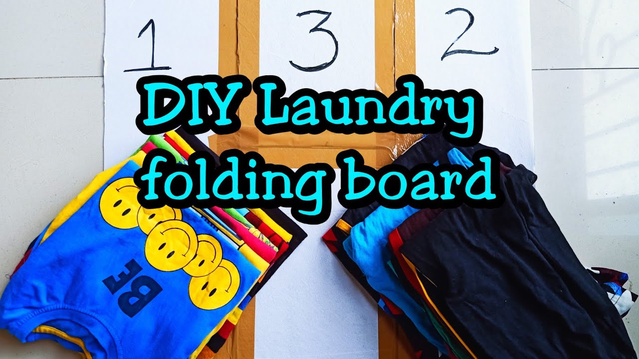 DIY laundry folding board folding tshirt by toddlers less than 2