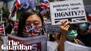 Hundreds of hong kong protesters sang god save the queen and waved
union flag as they rallied outside british consulate on sunday to
demand uk en...