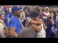 Kansas player Ochai Agbaji has emotional moment with his family after winning NCAA title game