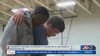 Students mourn the loss of a classmate killed in a vehicle accident