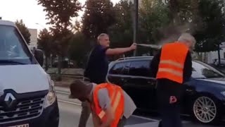 Angry motorist pepper sprays climate activists in the face