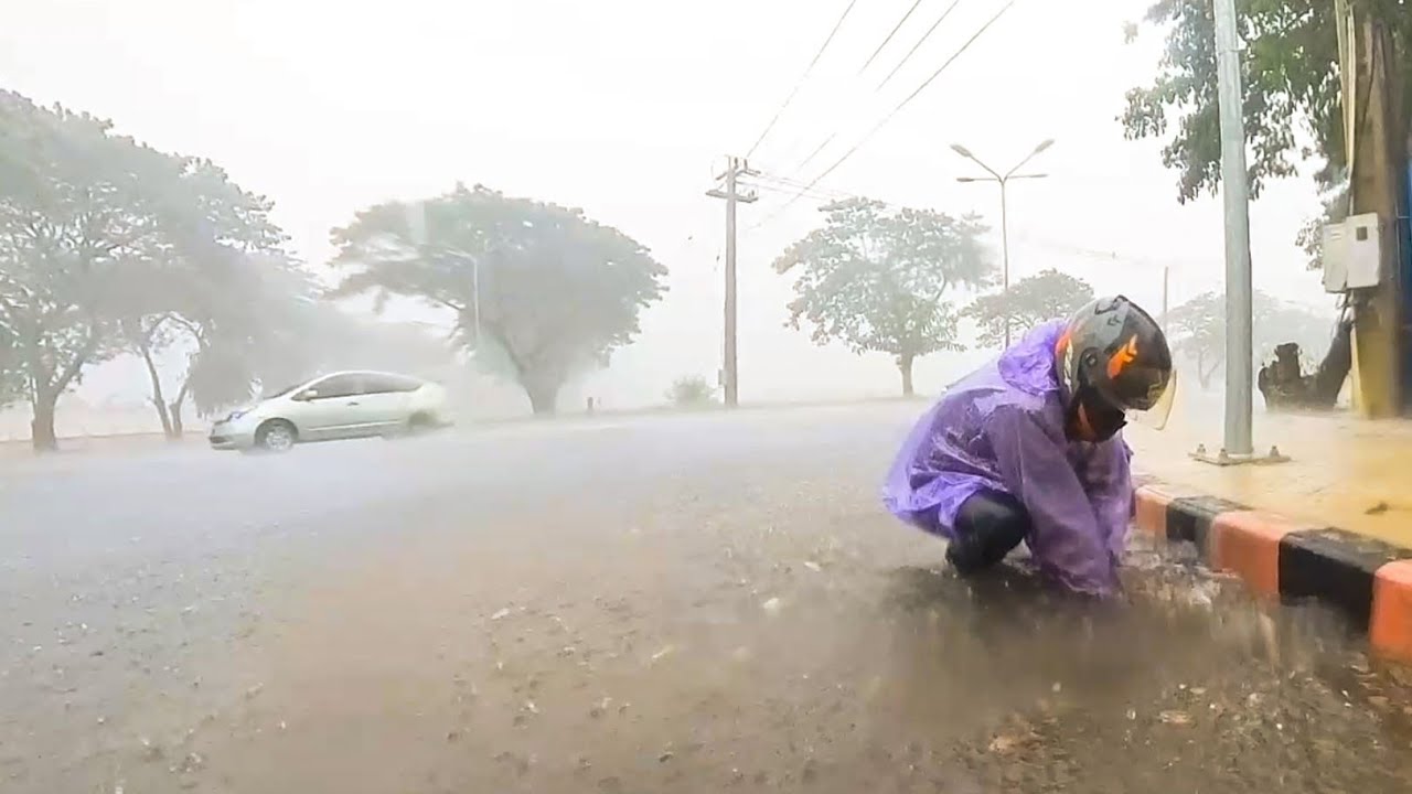 Unclogging Culvert Drain After Heavy Rain On The Road - YouTube