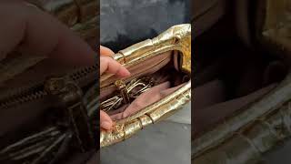 Gold python bag