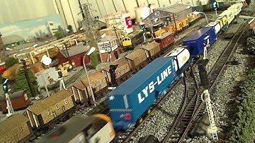 CLASS 20 PULLING OUT CLASS 37 WITH 12 DOUBLE FRAIGHT WAGONS
