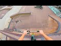 Impossible skatepark scooter drop in