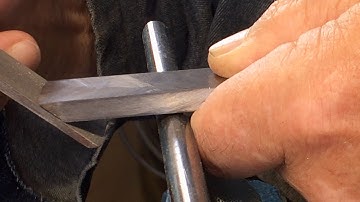 Richard Raffan honing a scraper