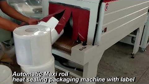 Automatic Maxi roll heat sealing packaging machine with label