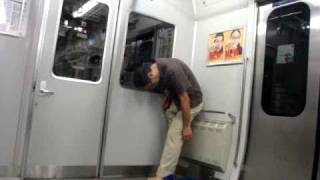 Japanese guy falls asleep standing up