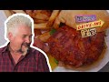 Guy Fieri Tries a Bacon and Blue Cheese Stuffed Burger | Diners, Drive-ins and Dives | Food Network