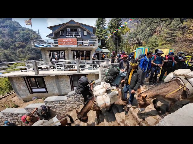 Crowd on the way to Everest Base Camp via Namche Bazar | Walking under Mount Everest 2024 class=