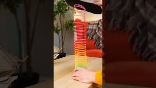 Rainbow slinky crocodile in reverse 🐊🌈 #uniquetoy #comedy #reversefun