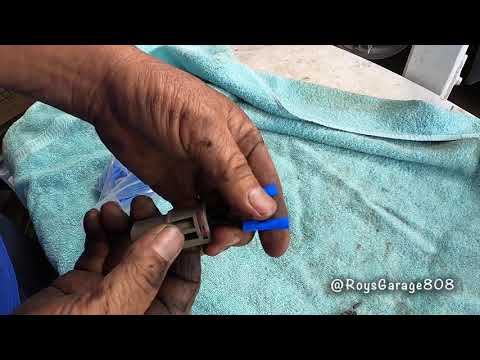 How to Replace the Reverse Light Switch on a 2004 Nissan Frontier