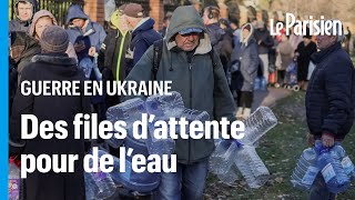 Privés d'eau après les frappes russes, des habitants de Kiev se ruent sur la fontaine d'un parc