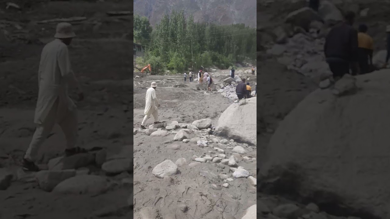 Crossing debris After Glacier Burst in Gulmit 