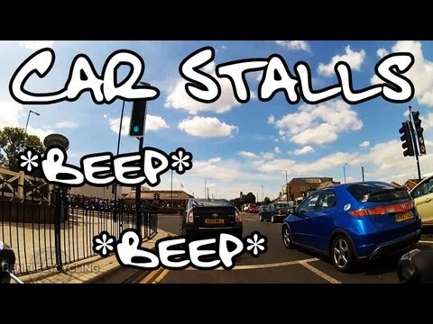 Blue Car stalls at traffic lights folowed by a beep from behind GOPRO HD