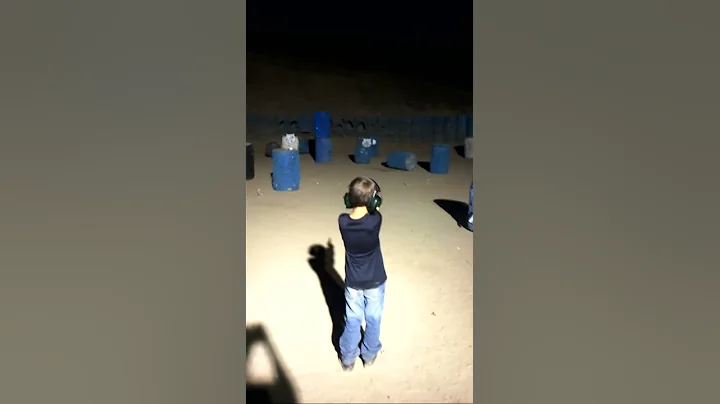 7 year old boy shooting a 22 pistol