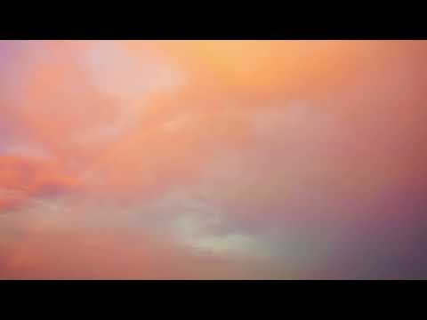 The sky is burning clouds and rainbows