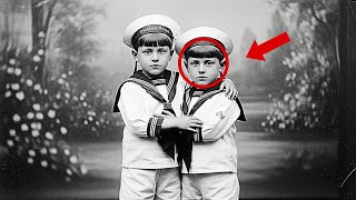 A 1910 photo of twins looks sweet, but zooming in on one reveals a macabre secret