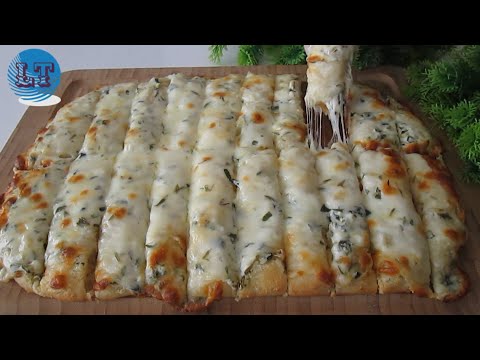 Video: Fesleğen, Sarımsak Ve Peynir Ile Pizza Nasıl Yapılır