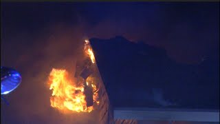 Fire rips through roof of two-story home; 2 dogs, cat rescued, fire officials say
