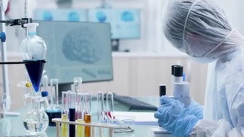 Scientist Working In Modern Lab Stock Video