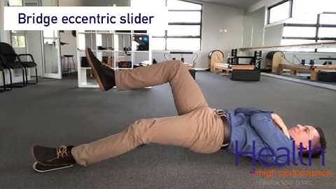Bridge eccentric slider for hamstring, hip & core strength | Melbourne Sports Chiropractor