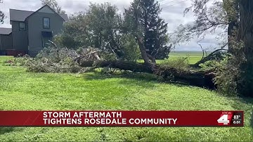 People on Rosedale Road clean up from storms