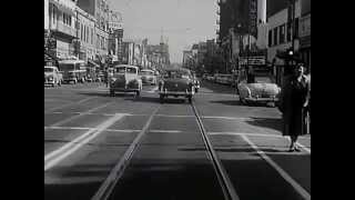 Los Angeles streets: Hollywood Blvd & Highland Ave traffic. Early 1950s VINTAGE LOS ANGELES