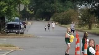 Three year old finish 5k run WITH AWSOME KICK  (MUST SEE)