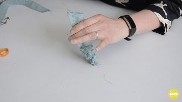 Turning through a strap or belt with a loop turner.