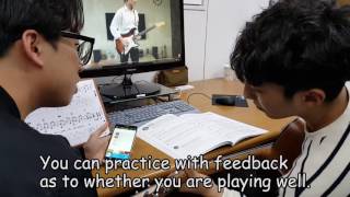 Real time Recognition of Guitar Performance Using Two Sensor Groups for Interactive Lesson