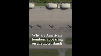 Why are American bombers appearing on a remote island?