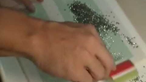 How to Brush Rhinestones on a custom template material. www.therhinestoneworld.com