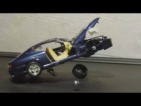 Toy Ferrari vs Slingshot
