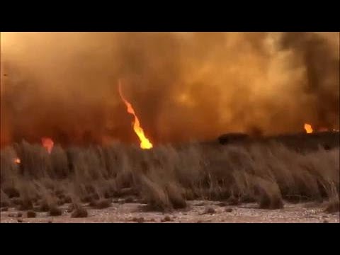 springboard Close-up: 'Firenado' caught on camera in wind whipped fires
