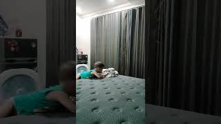 One Little Toddler Jumping On The Bed