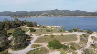 Folsom Lake near empty from drought October 2021, and now filling April 2022 - CA HD 4k drone video