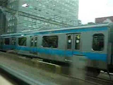 E233京浜東北線 並走から抜かれる