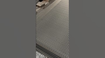 Are you impressed by this CNC punching machine ideal for machining dense holes? #cnc #punching