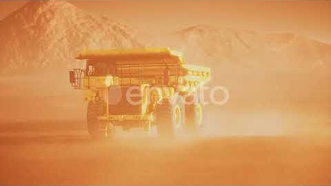 Big Yellow Mining Truck in the Dust at Career | Motion Graphics - Envato elements